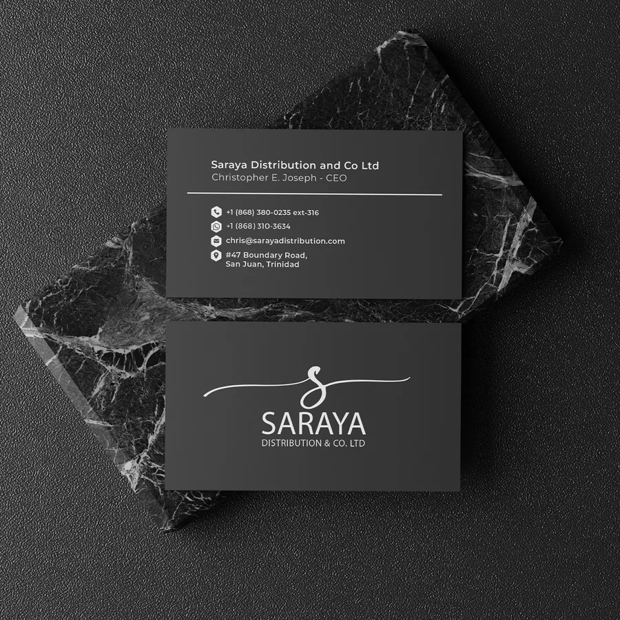 Saraya Distribution business cards on black marble